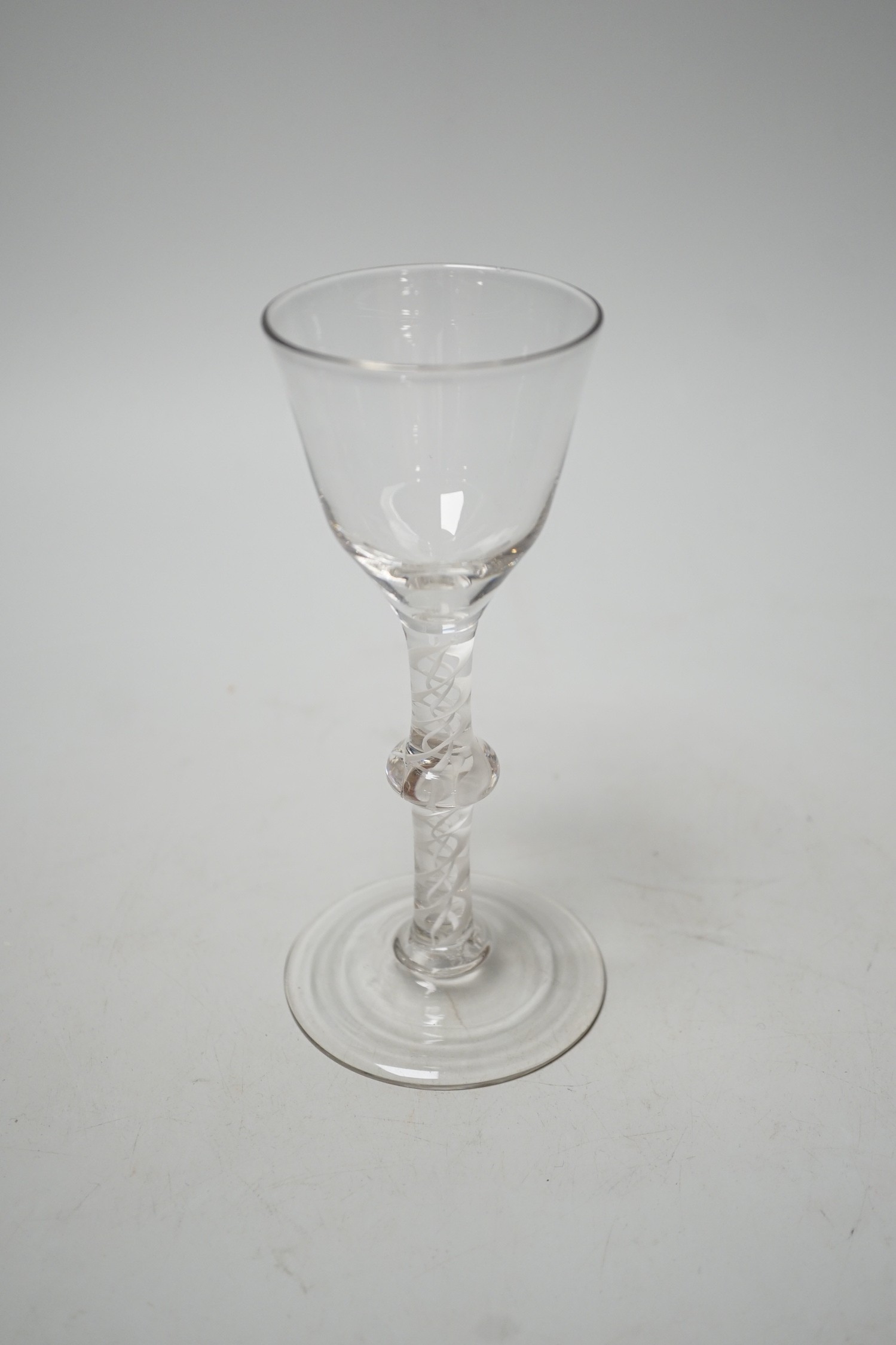 Mid 18th century opaque-twist stem wine glass. 16cm tall